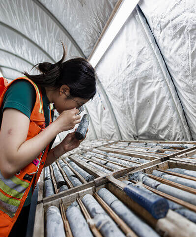 Worker inspecting core